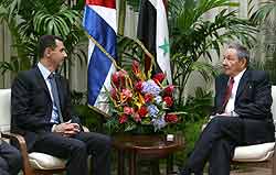 Conversan presidentes de Cuba y Siria